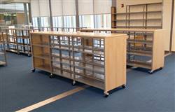 Library shelf with wheel